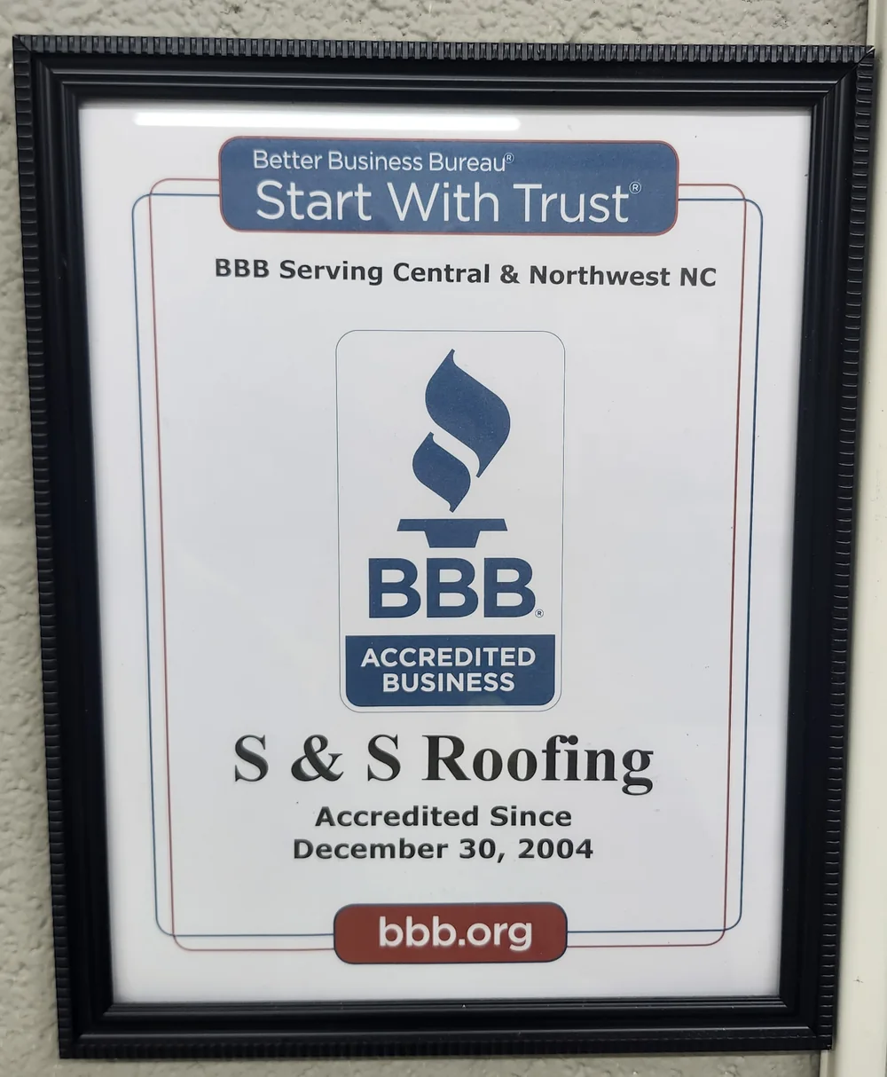 Better Business Bureau Accredited Business plaque — S&S Roofing accredited since 2004