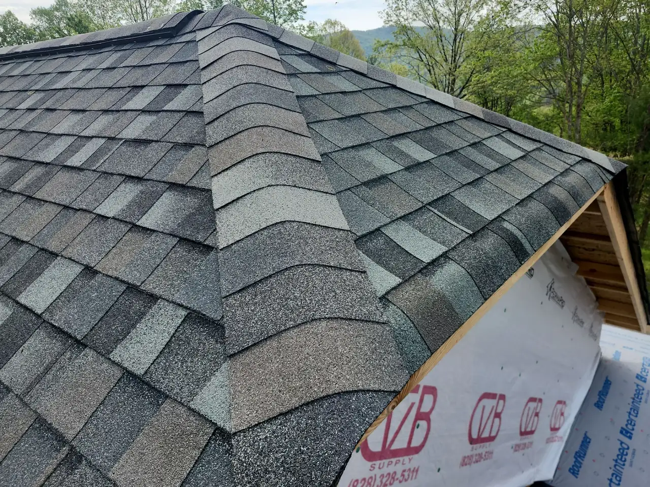 New-construction roof in TAMKO Heritage Thunderstorm Grey shingles on a residential home in Lenoir, NC by S&S Roofing
