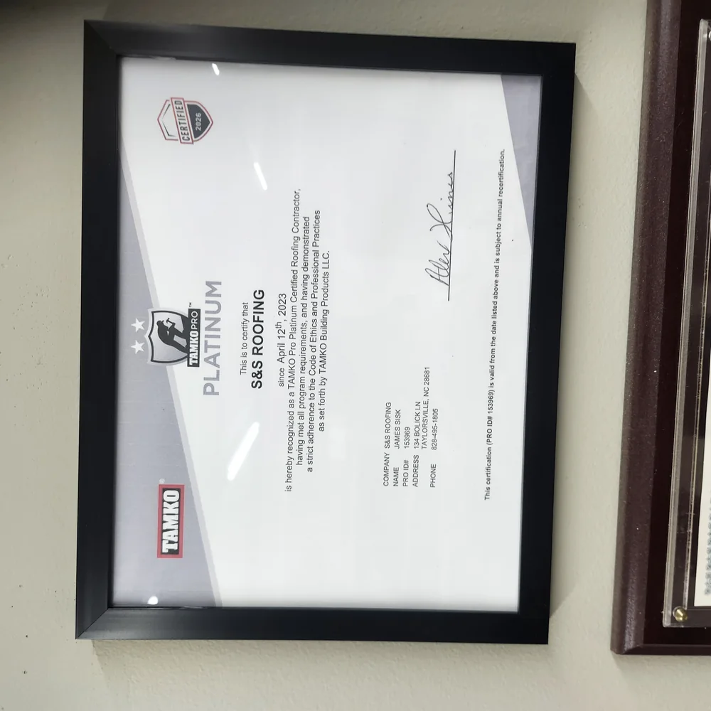 TAMKO Pro Platinum Roofer certification plaque at the S&S Roofing office